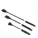 Récolte en cuir noir et doré