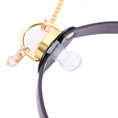 Pacifier Gag with Bell Nipple Clamp
