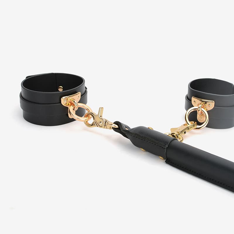 Kit de bondage con barra esparcidora de cuero