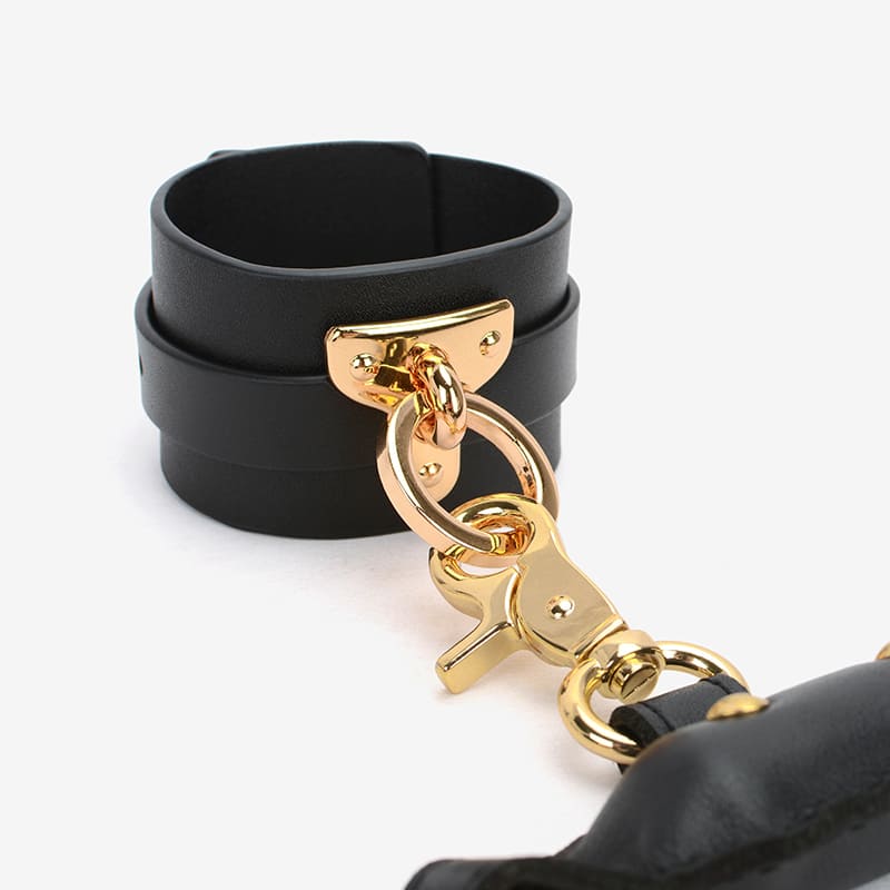 Kit de bondage con barra esparcidora de cuero